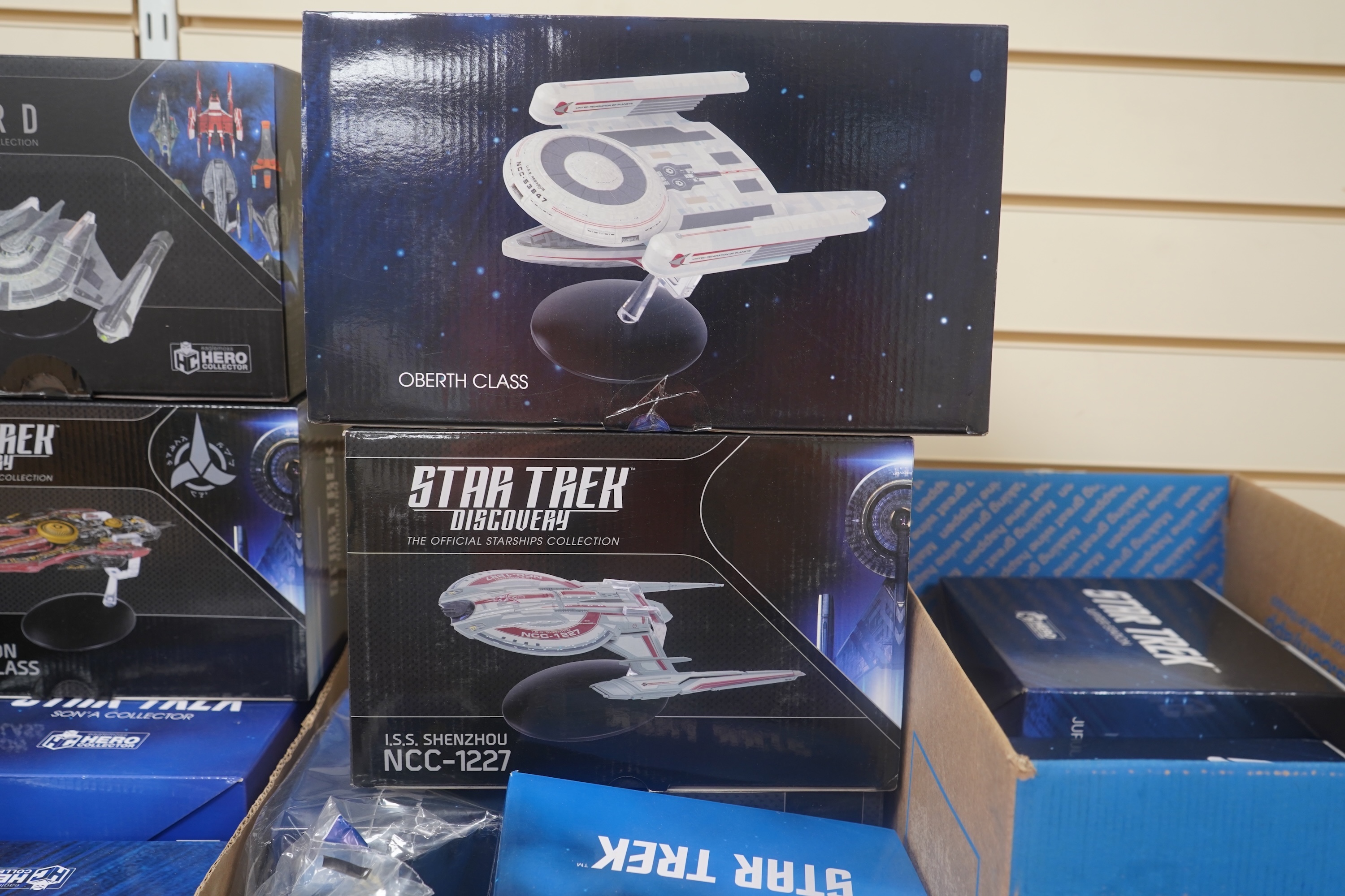 Nineteen boxed Eaglemoss Star Trek magazine issue models, including; a Vulcan Cruiser, a Klingon Qugh Class vessel, a Son’a Battleship, a Romulan Flagship, Jupiter Station, Ty’Gokor Orbital Station, etc. Condition - good